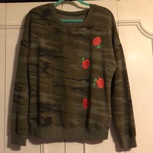 Camouflage sweatshirt.